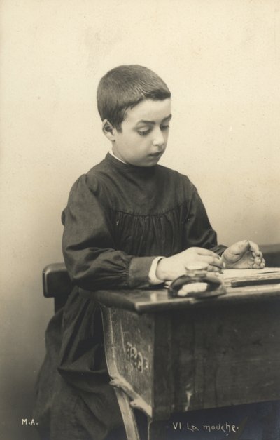 Child at a desk by French Photographer